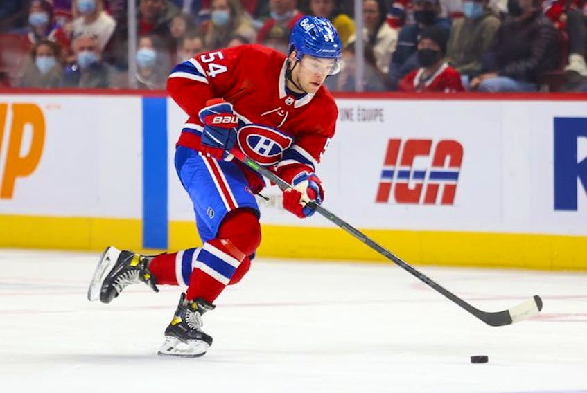 Montreal Canadiens defenceman Jordan Harris handles the puck during first period of National Hockey League game against the Ottawa Senators in Montreal Tuesday, April 5, 2022. 