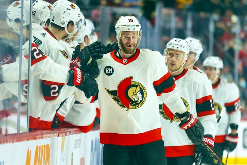 Ottawa Senators' Austin Watson celebrates his goal with teammates during first period of National Hockey League game against the Montreal Canadiens in Montreal Tuesday, April 5, 2022.