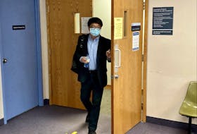 Acupuncturist Xiao Han Li leaves Dartmouth provincial court Wednesday after more than two hours of questioning by the Crown attorney at his sexual assault trial.