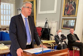 Housing Minister John Lohr announces changes to the Halifax Municipality Charter that will help streamline the approval process for residential housing developments at Province House on Wednesday, April 6, 2022.