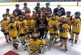 Brianna Burris holds the Cobra Spirit Trophy she recently received as the West Colchester Minor Hockey Association’s volunteer of the year. The trophy is named in honour of Jamie and Greg Blair, Lisa McCully, Heather O’Brien, Kristen and Baby Beaton. Contributed