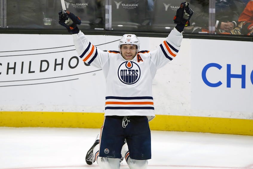 Edmonton Oilers centre Leon Draisaitl reacts after scoring against the Anaheim Ducks in Anaheim, Calif., on Sunday, April 3, 2022. The Oilers won 6-1.