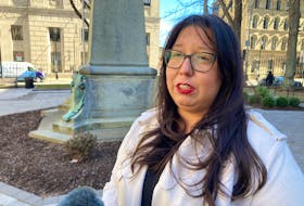 Blaire Gould, executive director of Mi'kmaw Kina'matnewey, speaks to reporters outside Province House in Halifax on Thursday, April 7, 2022, about the Mi'kmaw Language Act that is intented to revitalize the language. -- Francis Campbell photo