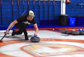 Rory Shaw focuses on his play during curling action at the Sydney Curling Club Tuesday evening. Shaw will be among the players taking part in the Mercer Fuels Cash Spiel this weekend at the George Street club in Sydney. In total, 16 teams will participate. JEREMY FRASER/CAPE BRETON POST.