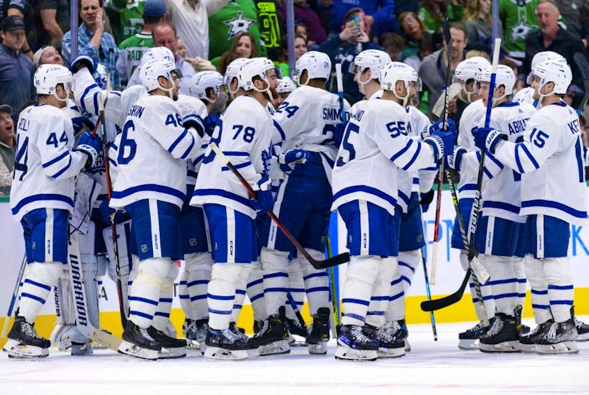 Toronto Maple Leafs players celebrate their team's win over the Dallas Stars on April 7, 2022.
