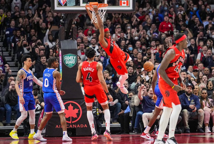 Precious Achiuwa of the Toronto Raptors goes up for a slam dunk against the Philadelphia 76ers during the first half of their basketball game at the Scotiabank Arena on April 7, 2022 in Toronto.