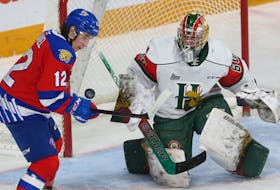 Moncton Wildcats  Alexis Daniel, tries to control a rebound in front of Halifax Mooseheads goalie Mathis Rousseau during QMJHL action Friday April 8, 2022.

TIM KROCHAK PHOTO
