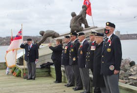 Several members of the Cape Breton Naval Veterans Association were on hand during Sunday's ceremony to honour the Battle of the Atlantic at the Merchant Mariners monument on the Sydney boardwalk. IAN NATHANSON/CAPE BRETON POST