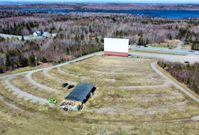 The Cape Breton Drive-In Theatre is slated to open on Friday. The Grand Lake Road entertainment centre has been showing films on the really big screen since 1975. The outdoor drive-in did not open in 2021 due to the COVID-19 pandemic. The Sydney-Glace Bay highway and Grand Lake are visible in the background. DAVID JALA/CAPE BRETON POST