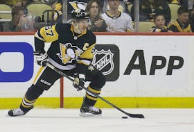 May 9, 2022; Pittsburgh, Pennsylvania, USA;   Pittsburgh Penguins center Sidney Crosby (87) handles the puck against the New York Rangers during the first period in game four of the first round of the 2022 Stanley Cup Playoffs at PPG Paints Arena. Mandatory Credit: Charles LeClaire-USA TODAY Sports  Pittsburgh Penguins centre Sidney Crosby handles the puck against the New York Rangers during the first period of Game 4 of the first round of the 2022 Stanley Cup Playoffs at PPG Paints Arena in Pittsburgh. - Charles LeClaire-USA TODAY Sports