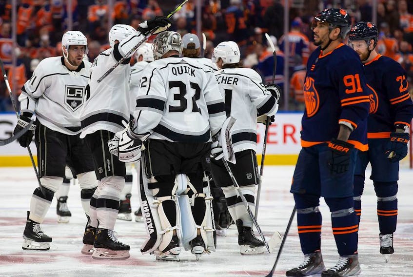  The Los Angeles Kings celebrate a 5-4 victory over the Edmonton Oilers in overtime in Game Five of the First Round of the 2022 Stanley Cup Playoffs at Rogers Place on May 10, 2022.