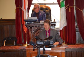 Charlottetown Mayor Philip Brown, top, and Peter Kelly are shown just prior to a private meeting of city council where Kelly’s role as chief administrative officer, was terminated, effective immediately. Dave Stewart • The Guardian