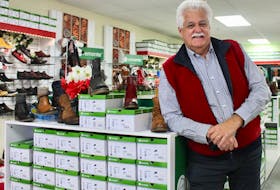 Bruce Meloney is shown at the Rieker By The Shoe Tree store that he and his wife Lizz own and operate on Charlotte Street in Sydney. GREG MCNEIL/CAPE BRETON POST