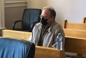 Robert Layman, 72, sits in Newfoundland and Labrador Supreme Court in St. John's during a break in his sexual assault trial.
