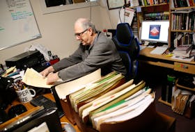 FOR SCHNEIDEREIT STORY:
Retired Canadian military veteran Tim Dunne is sene with some of the documents related to his military career in the basement office of his  Dartmouth home April 22, 2022.