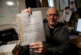 FOR SCHNEIDEREIT STORY:
Retired Canadian military veteran Tim Dunne is seen  with a letter acknowleding that he may disclose the "Watkin memo"... in the offfice of his Dartmouth home April 22, 2022.