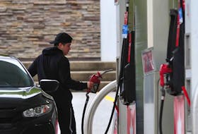 Some motorists are willing to pay more for the price of gas. Others are considering trading in gas-guzzling cars for more efficient vehicles. Nick Procaylo/Postmedia News