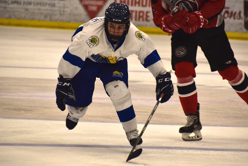 Sydney’s Brody Dawson of Team Atlantic chases down a puck during action at the National Aboriginal Hockey Championship earlier this week at the Membertou Sport and Wellness Centre. The forward played last season with the Joneljim Cougars of the Nova Scotia Under-15 Major Hockey League. JEREMY FRASER/CAPE BRETON POST.