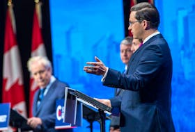 Conservative leadership candidates Leslyn Lewis, Roman Baber, Jean Charest, Scott Aitchison, Patrick Brown and Pierre Poilievre take part in the Conservative Party of Canada English leadership debate in Edmonton on May 11, 2022.