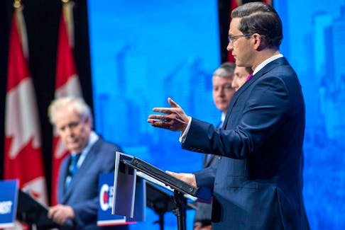 Conservative leadership candidates Leslyn Lewis, Roman Baber, Jean Charest, Scott Aitchison, Patrick Brown and Pierre Poilievre take part in the Conservative Party of Canada English leadership debate in Edmonton on May 11, 2022.