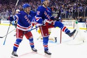  Rangers forwards Frank Vatrano, left, and Filip Chytil, right, celebrate Chytil’s third period goal against the Penguins in Game 5 of the first round of the 2022 Stanley Cup Playoffs at Madison Square Garden in New York City, Wednesday, May 11, 2022.