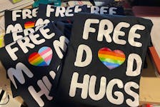 No matter what the words, Free Mom Hugs, Free Day Hugs, or just Free Hugs, a group of people around Corner Brook and the Bay of Island will be wearing these shirts to show their support for the LGBTQ2S+ community. The Free Mom Hugs group was started by Connie Winsor, a member of the Corner Brook – Bay of Islands Pride committee.