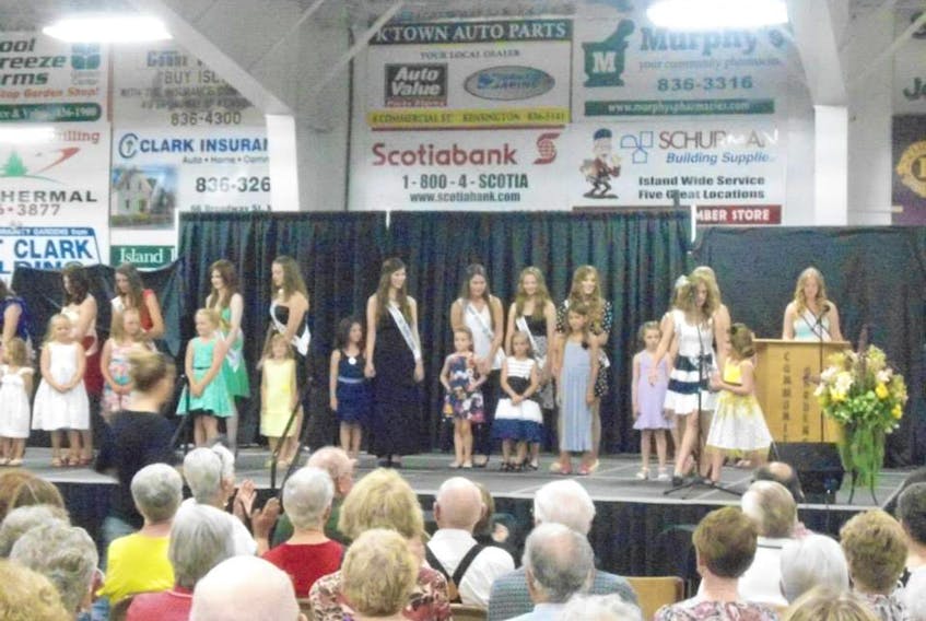 Miss Community Gardens pageant contestants stand with their escorts during the 2013 Kensington Harvest Festival. The pageant is being updated this year to include all genders.