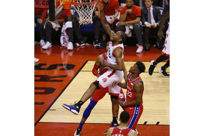 Toronto Raptors Kawhi Leonard SF (2) goes in for points during the third quarter in Toronto, Ont. on Sunday, May 12, 2019