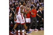 Toronto Raptors Kawhi Leonard SF (2) is congratulated by the bench in the fourth quarter in Toronto, Ont. on Sunday, May 12, 2019