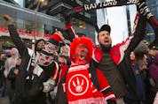 The Toronto Raptors' faithful  fans celebrate  in Jurassic Park as their Raptors play against the Philadelphia 76ers, in Toronto, Ont. on Sunday, May 12, 2019