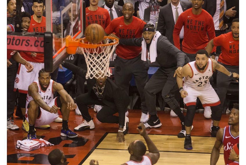 Kawhi Leonard watches as his game winning ball goes in to clinch the series in Game 7as their Raptors defeat the Philadelphia 76ers,   in Toronto, Ont. on Sunday, May 12, 2019