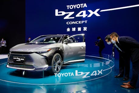 Toyota rolls out first battery electric car in cautious debut as rivals go full-throttle