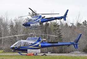 A Department of Natural Resources and Renewables helicopter departs with personnel and supplies to head to the scene of a wildfire in Yarmouth County on the afternoon of May 13. The wildfire, which has been burning since May 9, was said to be about 70 percent contained. TINA COMEAU PHOTO