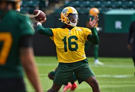 Quarterback Khalil Tate (16) throws during the first day of Edmonton Elks rookie camp at Commonwealth Stadium in Edmonton on Wednesday, May 11, 2022.