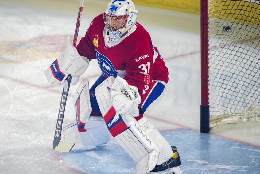 Laval Rocket goaltender Cayden Primeau warms up prior to an AHL playoff game against the Syracuse Crunch in Laval on May 12, 2022.