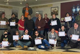 Graduating class of security training for the upcoming Nova Scotia Mi'kmaw Summer Games with event coordinator Isaiah Bernard, top row. Second row, from left: trainer Mike Kuba, participants David Marshall and Sequoyah Denny, councillors Anita Basque and Wayne Johnson, MB2 Universal security owner Sean Ginnish, Chief Wilbert Marshall, Loretta O’Toole, Raven Goodwin, Nolan Marshall, brothers Mason and Garrison Sylliboy. Front row from left: Henry Isaac, Liza Isaac, Leah Johnson and her son Evan Johnson, Rebecca Johnson, Sandy Faye Marshall, Brian Francis and Charlie Isaac Jr. CONTRIBUTED