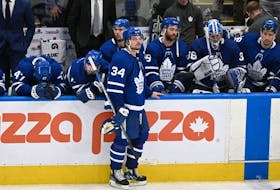 Centre Auston Matthews stands at the bench after the Maple Leafs lost Game 7 of their opening round series to the Tampa Bay Lightning on Saturday night at Scotiabank Arena.