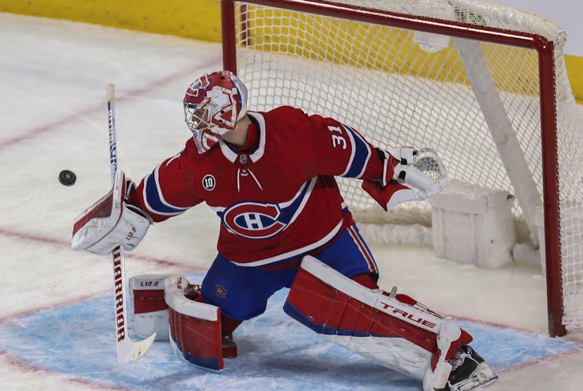 Carey Price of the Montreal Canadiens makes a blocker save against the Florida Panthers in the first period at the Bell Centre in Montreal on April 29, 2022. 