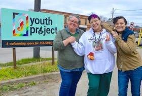 Jay Denny, centre, is seen with Cape Breton Youth Project co-ordinator Madonna Doucette, left, and BIPOC support services educator Jana Reddick outside the organization's office in Syndey on Wednesday. Denny, a Mi'kmaq activist, artist, matriarch and environmentalist, recently joined the team as its two-spirit community educator. “Two-spirits were seen as healers and warriors of love in our communities,” said the 21-year-old Eskasoni resident. Chris Connors/Cape Breton Post