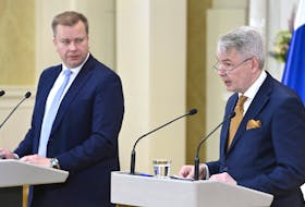 Finland's Defence Minister Antti Kaikkonen and Finland's Foreign Minister Pekka Haavisto attend a news conference on Finland's security policy decisions at the Presidential Palace in Helsinki, Finland, May 15, 2022.  Heikki Saukkomaa/ Lehtikuva/via REUTERS      ATTENTION EDITORS - THIS IMAGE WAS PROVIDED BY A THIRD PARTY. NO THIRD PARTY SALES. NOT FOR USE BY REUTERS THIRD PARTY DISTRIBUTORS. FINLAND OUT. NO COMMERCIAL OR EDITORIAL SALES IN FINLAND.  Finland's Defence Minister Antti Kaikkonen and Finland's Foreign Minister Pekka Haavisto attend a news conference on Finland's security policy decisions at the Presidential Palace in Helsinki, Finland on Sunday, announcing the country planned to apply for NATO membership. Heikki Saukkomaa/ Lehtikuva/via REUTERS