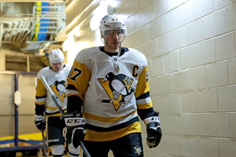 May 15, 2022; New York, New York, USA; Pittsburgh Penguins center Sidney Crosby (87) walks to the ice for warm-ups before game seven of the first round of the 2022 Stanley Cup Playoffs against the New York Rangers at Madison Square Garden. Mandatory Credit: Brad Penner-USA TODAY Sports  Pittsburgh Penguins centre Sidney Crosby walks down the hallway at Madison Square Garden on Sunday. - Brad Penner-USA TODAY Sports