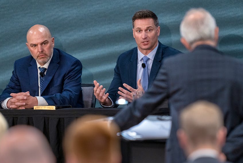 Commission counsel Roger Burrill, left,  questions RCMP Cpl. Tim Mills and Cpl. Trent Milton, right, as they testify about emergency response team actions at the Mass Casualty Commission in Dartmouth on Monday, May 16, 2022. - Andrew Vaughan / The Canadian Press / Pool