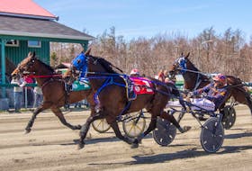 Revenant, #1, and driver Adam Lynk, edged out Runaway Mystery and Harold LeBlanc Jr, #4, with Southwind Ricardo a length back in third on opening day of 2022 at Northside Downs.