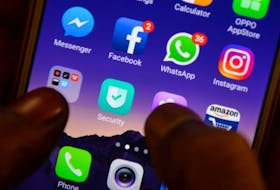 This file photo illustration taken on March 22, 2018 shows apps for Facebook, Instagram, Whatsapp and other social networks on a smartphone in Chennai, India.