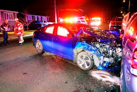 One man was sent to hospital after his car slammed into two parked vehicles in St. John's early Tuesday morning. Keith Gosse/The Telegram