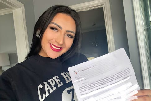 Kelly Paul of Membertou smiles with her acceptance letter from Walt Disney Parks and Resorts U.S. Inc. The student of the Hospitality and Tourism Management program at CBU is headed to Orlando, Fl. next month for a summer internship. Contributed