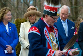 Prince Charles and Camilla, Duchess of Cornwall, look on during a smudging ceremony at the Heart Garden on Government House grounds in St. John’s Tuesday, May 17, during Royal Visit 2022. At left is Lt.-Gov. Judy Foote. Keith Gosse • The Telegram