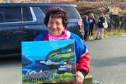 Longtime royal family supporter Linda Hennebury of Quidi Vidi waited three hours to meet Prince Charles, to whom she presented her own painting of the area when he stopped to shake her hand. "I told him to take care of his mother," she said. He said, 'I surely will.'" -Tara Bradbury/SaltWire Network
