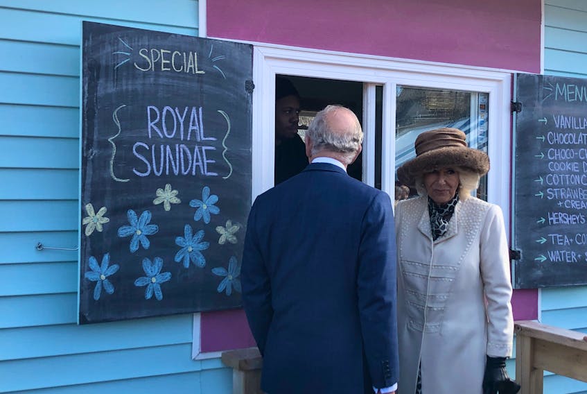 The Prince of Wales and Duchess of Cornwall make a quick visit to a Quidi Vidi Sweet Spot booth during their walkabout in Quidi Vidi Village Tuesday afternoon. -Tara Bradbury/SaltWire Network