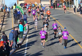 Runners head down Rainnie Drive toward the finish line during the 2021 Scotiabank Blue Nose Marathon last November in Halifax. The largest annual race weekend in Atlantic Canada returns to its usual Victoria Day weekend spot. - TIM KROCHAK / THE CHRONICLE HERALD